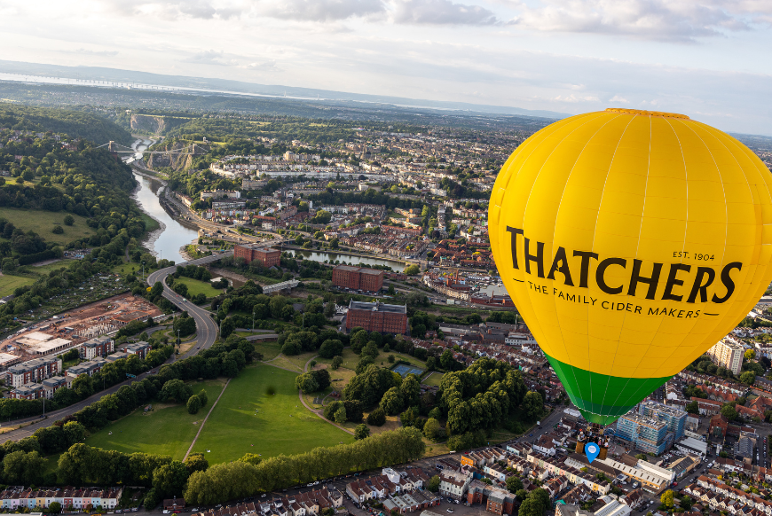 thatchers hot air balloon flying over bristol